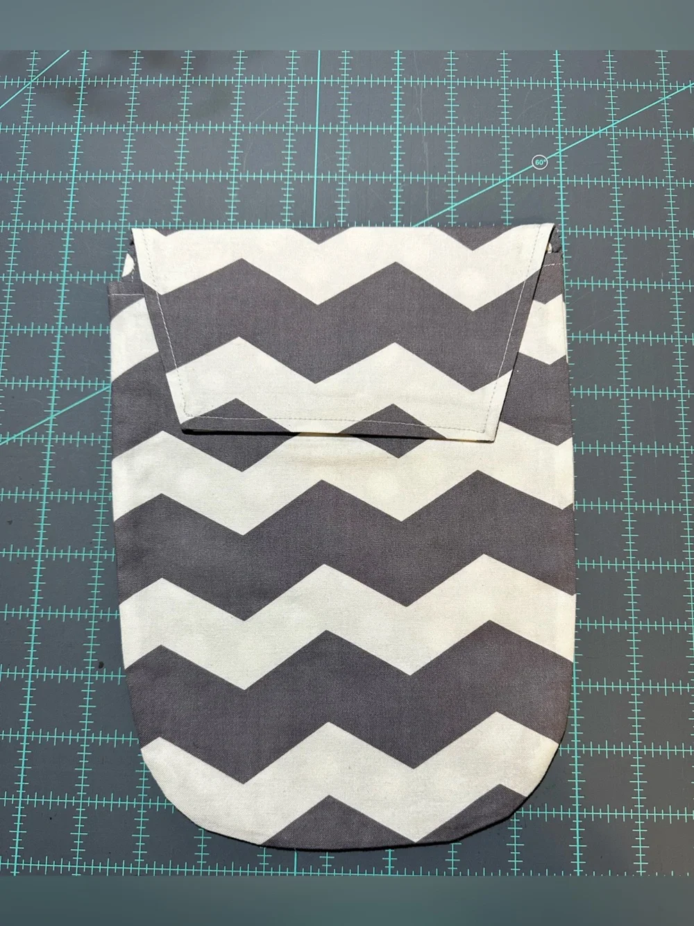 Gray Chevron Baby Bib and Diaper Pouch with Yellow Floral Accent